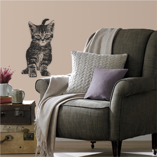 Black kitten wall decal in cozy reading corner – vinyl sticker styled above armchair – Art Decals