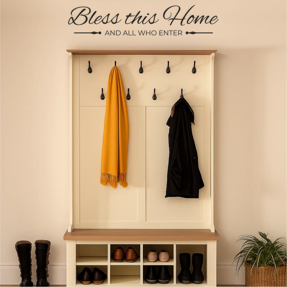 Bless This Home vinyl wall decal above hallway coat rack with shoes and clothes