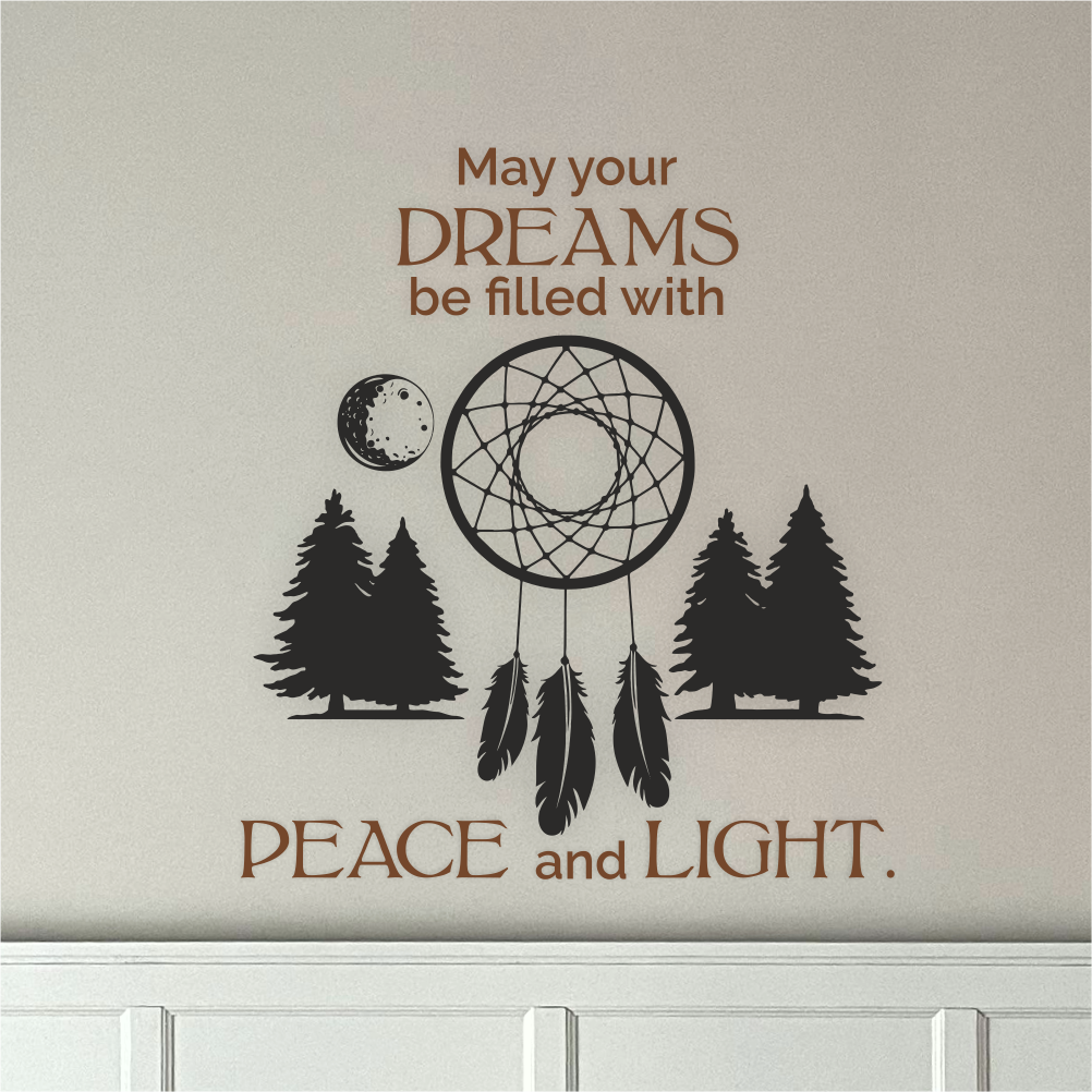Close-up of Dreamcatcher Serenity wall decal with moon and trees – calming vinyl quote above bed