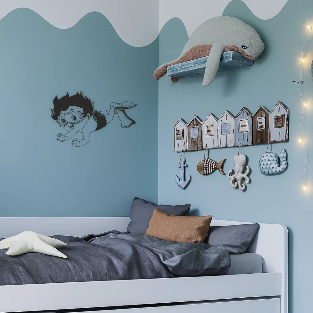 Diving boy wall sticker in sea-themed bedroom – playful underwater wall decal above kids’ bed with ocean decor