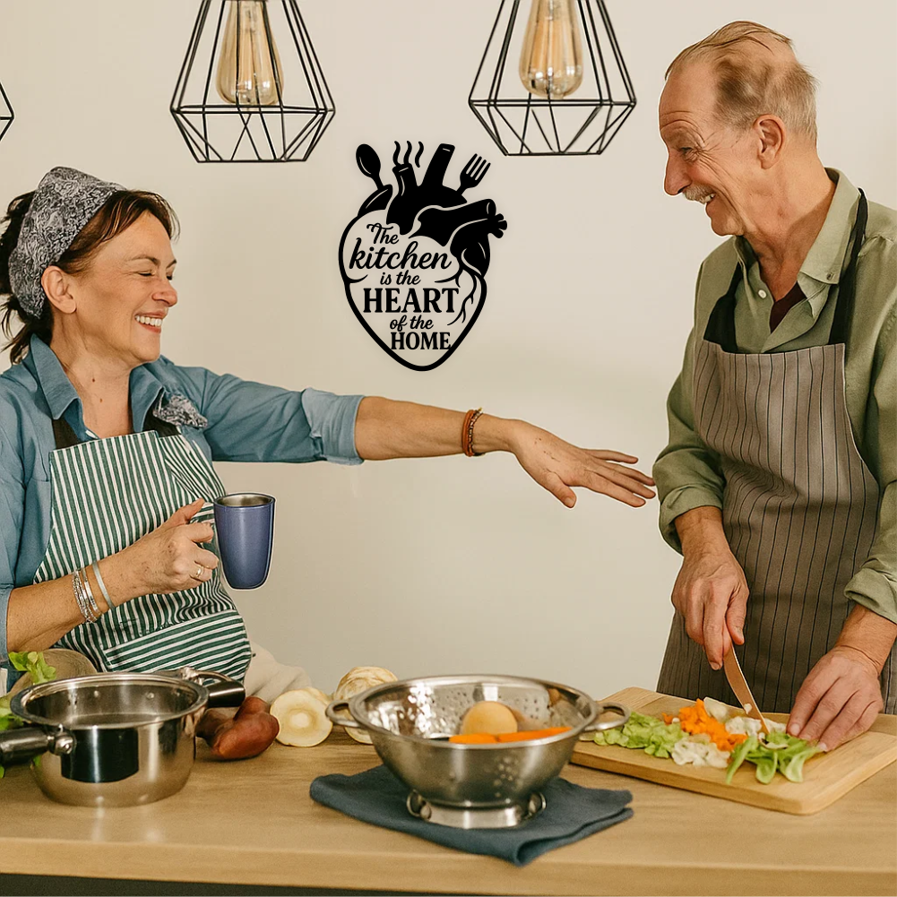 Older couple cooking together with The Kitchen is the Heart of the Home wall sticker on kitchen wall – lifestyle mockup