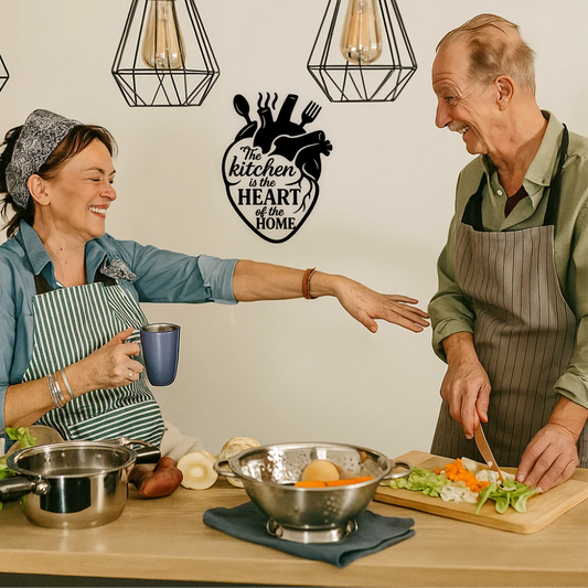 Older couple cooking together with The Kitchen is the Heart of the Home wall sticker on kitchen wall – lifestyle mockup