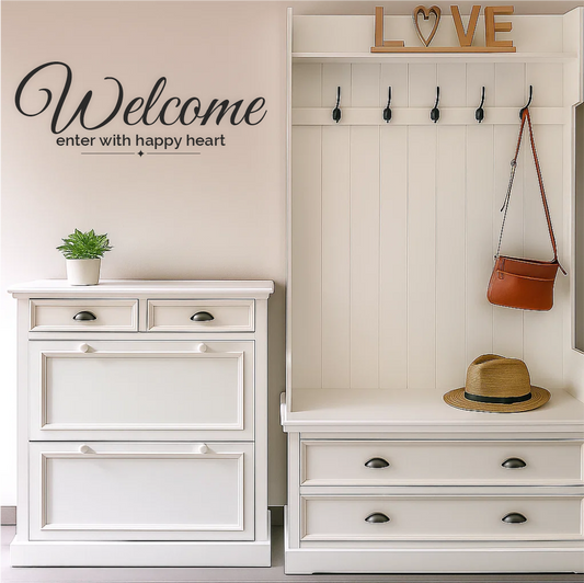 Welcome wall decal above white entryway cabinet with hat and bag – elegant hallway decor