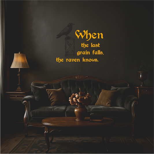 When the last grain falls, the raven knows wall decal applied above a sofa – poetic hourglass and raven design for living rooms
