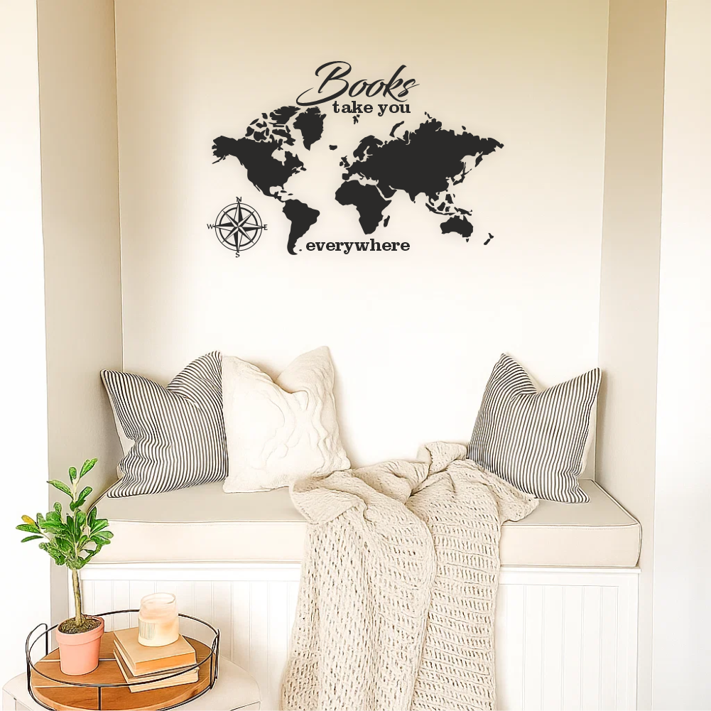 World map wall decal with reading quote in a cozy nook with pillows and blanket – bedroom reading corner