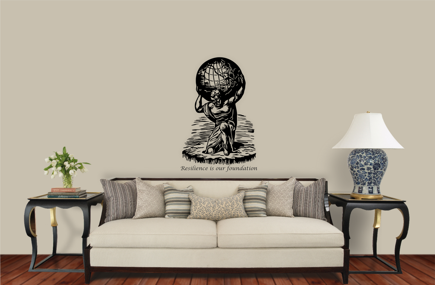 Atlas carrying the world decal above beige couch – inspirational living room wall art