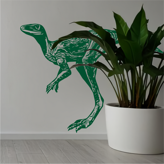 Green Velociraptor wall decal next to indoor plant – dynamic dinosaur room decor for modern interiors