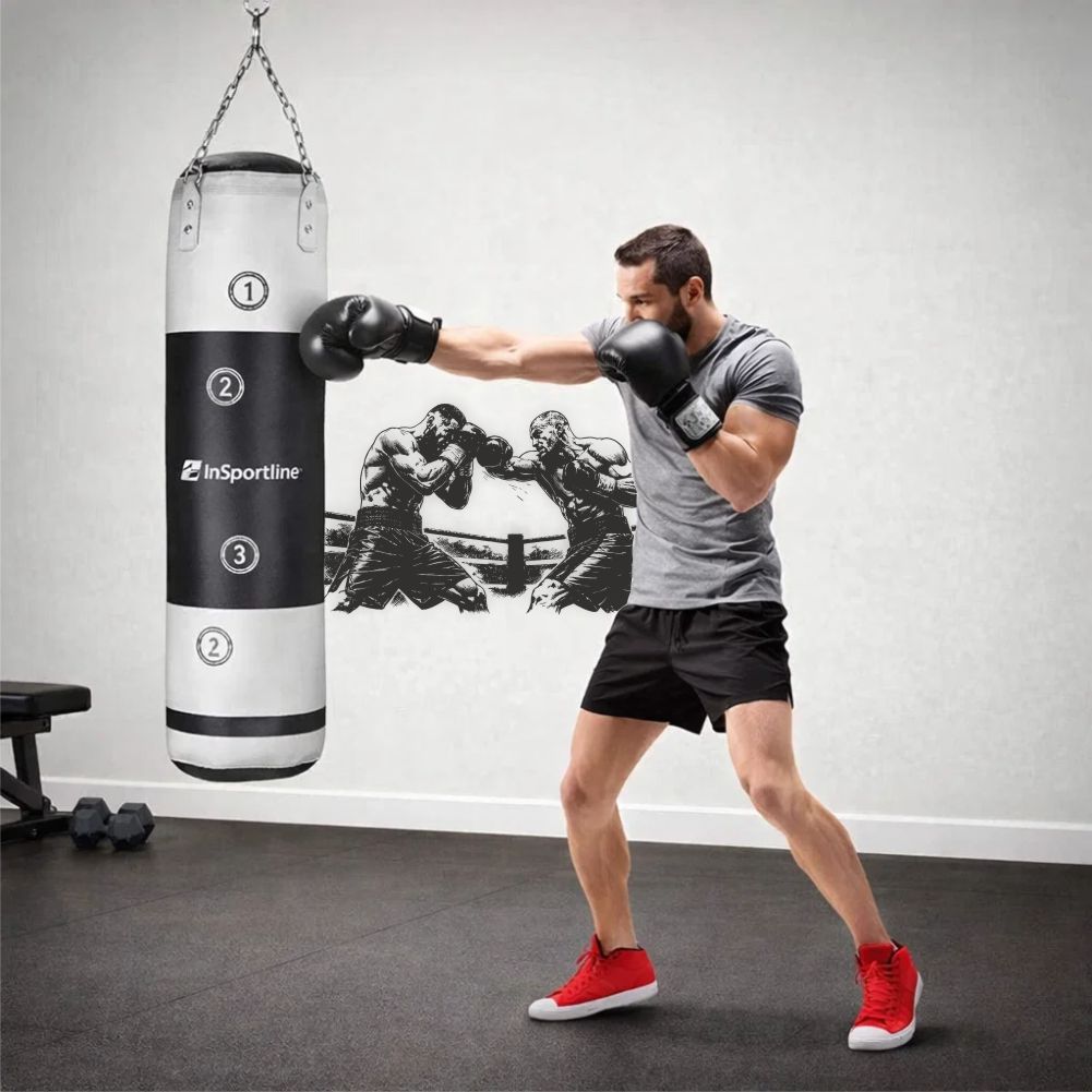 Man training with punching bag next to boxing wall decal in modern home gym – dynamic sports wall art
