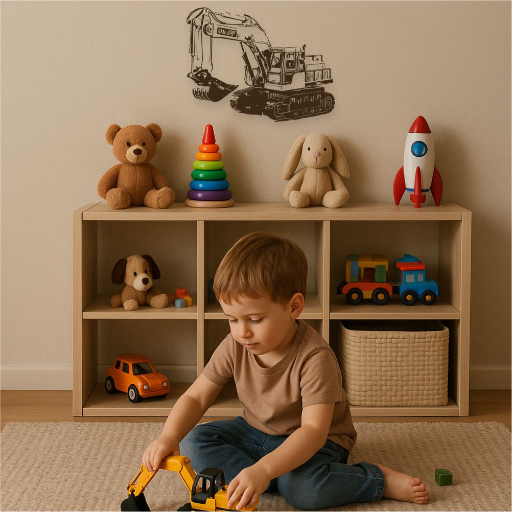 Boy playing with toy digger under excavator wall decal in kids’ room