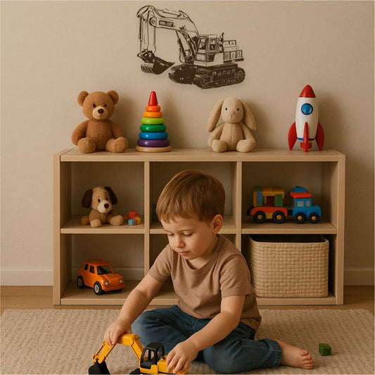 Boy playing with toy digger under excavator wall decal in kids’ room