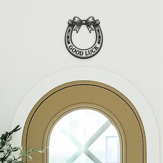 Good luck horseshoe wall decal above doorway – upward orientation