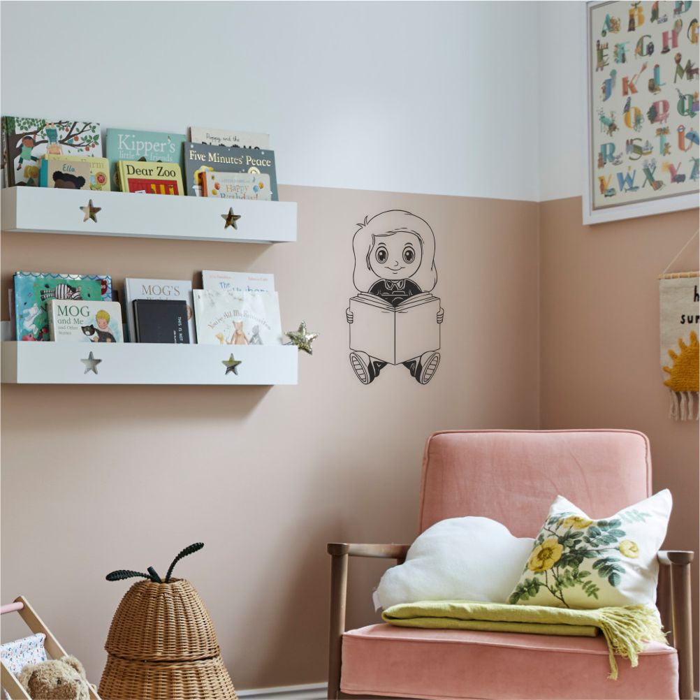 Small reader girl wall decal in kids’ room with books – reading themed wall decor